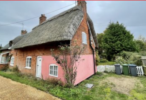 Thatched cottage for sale