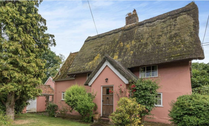 Thatched cottage for sale