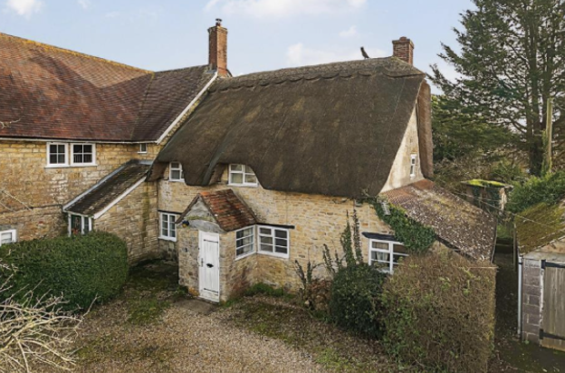 Thatched cottage for sale