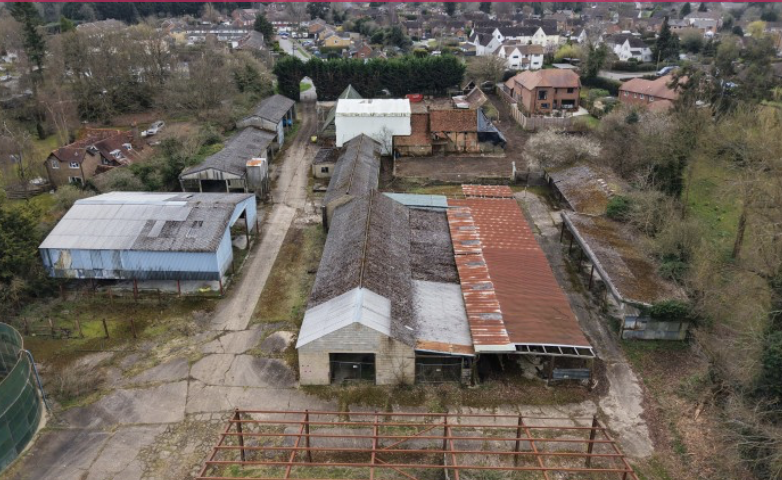 Farmhouse and barns for sale for redevelopment