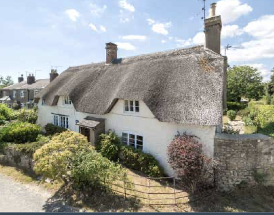 Thatched cottage for sale