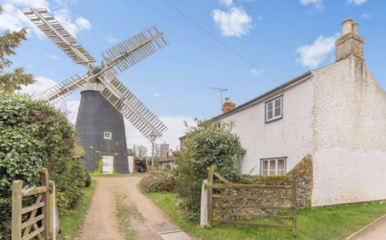 Windmill and house for sale