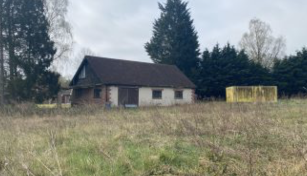 Workshop for sale with land